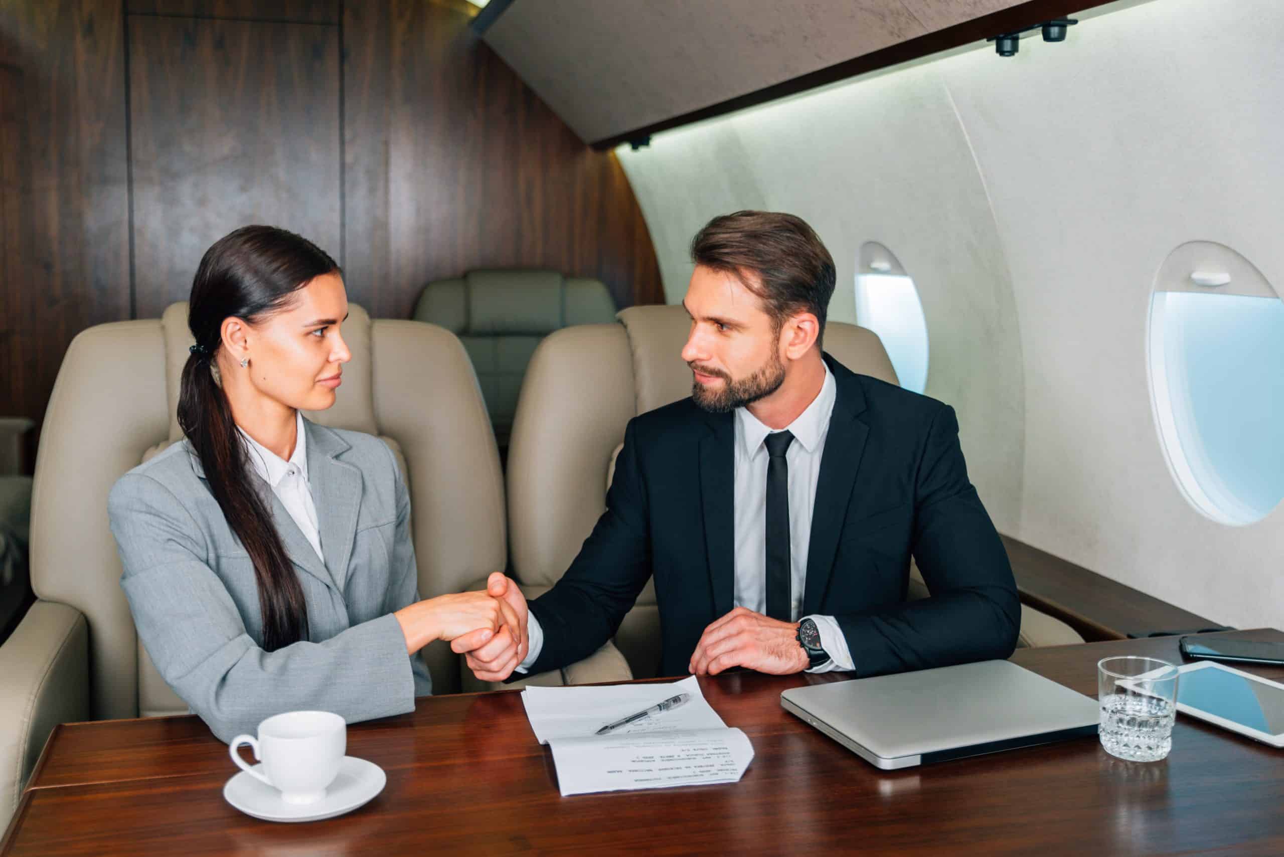Businessman flying in a private jet. Work on board the plane. Successful lifestyle of businessmen. Concept about merchants, affiliate marketers and sellers (7)